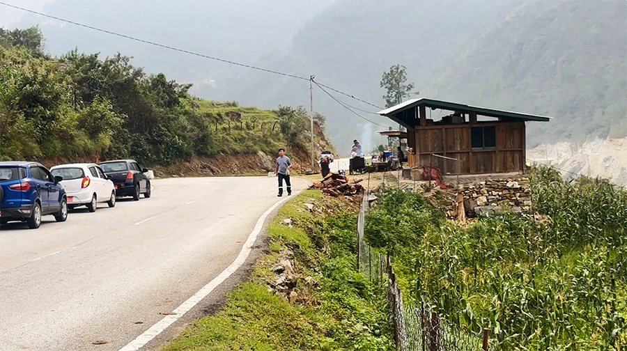 Tshering attending to his maize sales