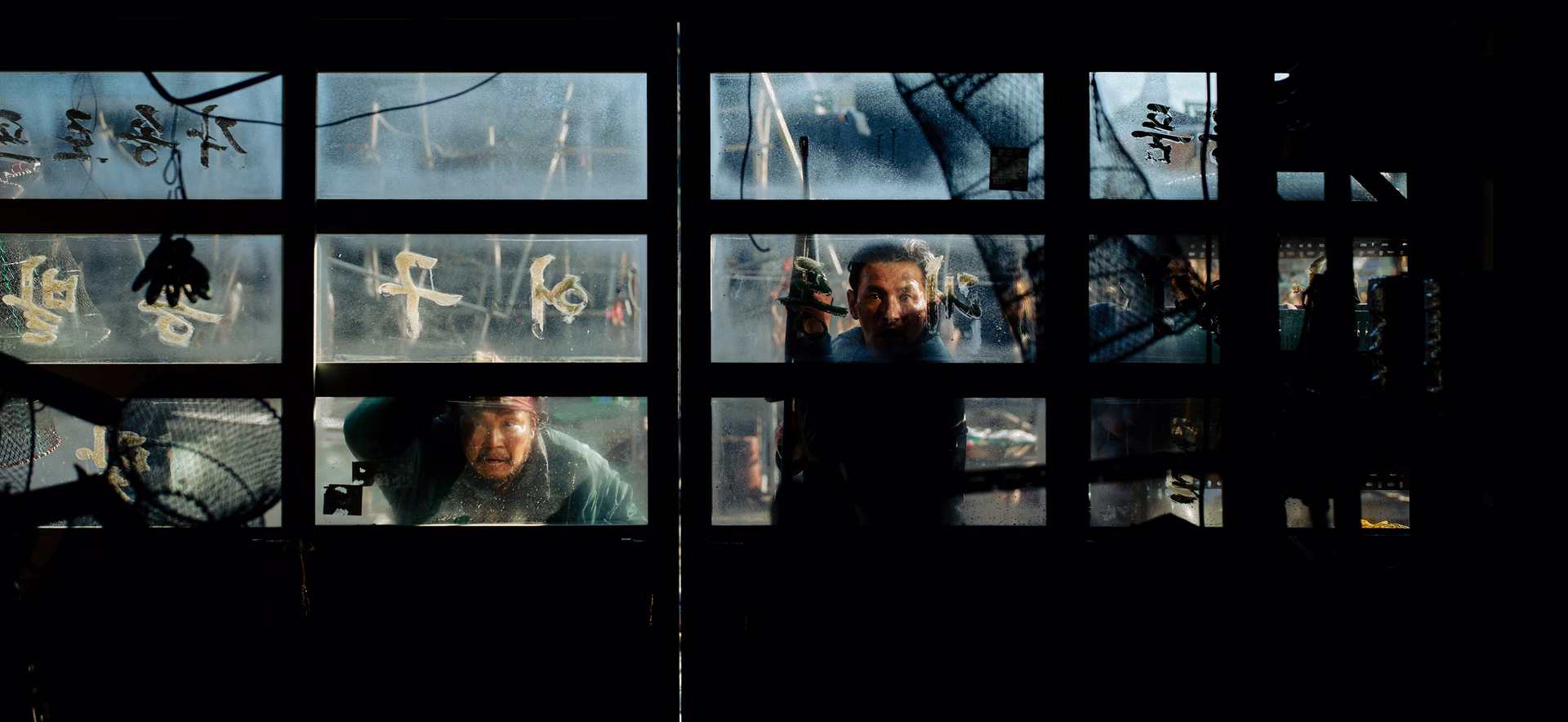 Hwang Jung Min in a tense scene