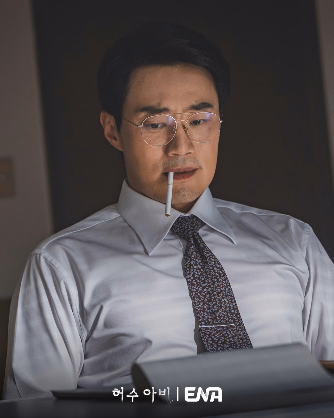 Lee Ki Beom arrives for questioning