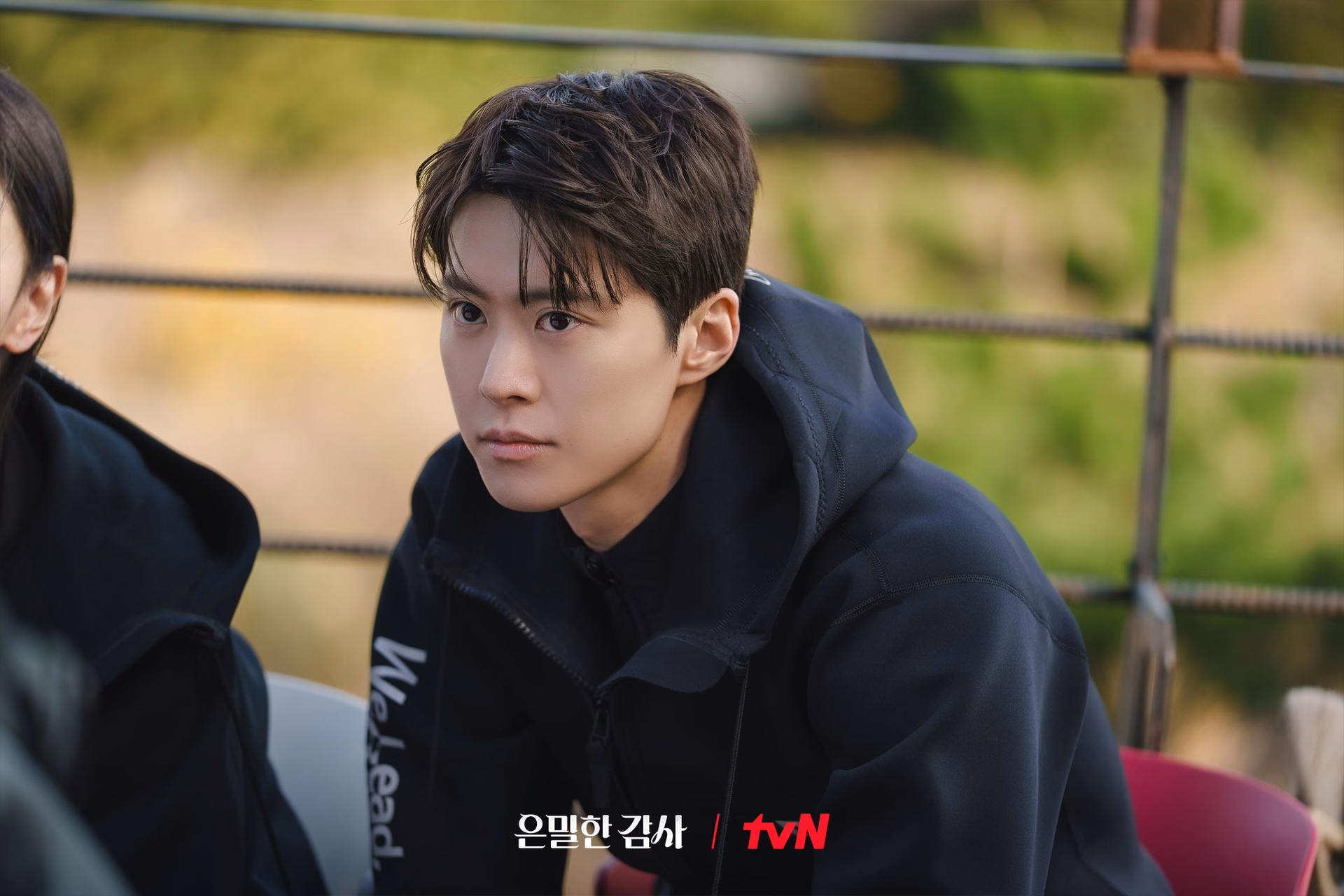 Gong Myoung with a focused look
