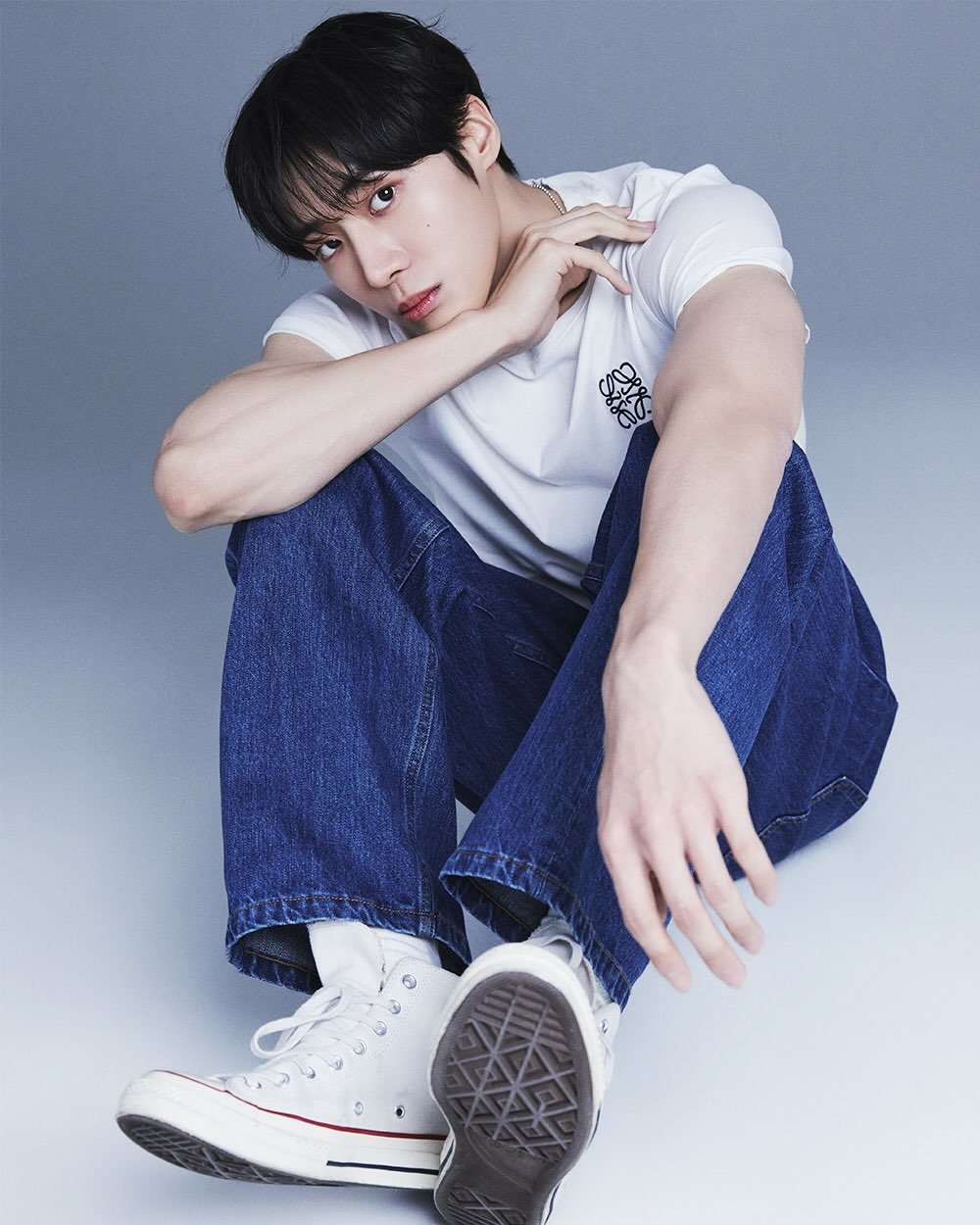 Choo Young Woo in a sleek black outfit