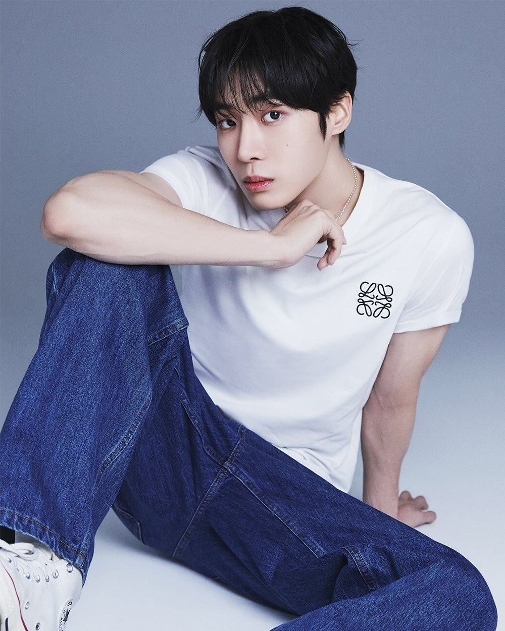 Choo Young Woo in a casual white T-shirt and denim pants