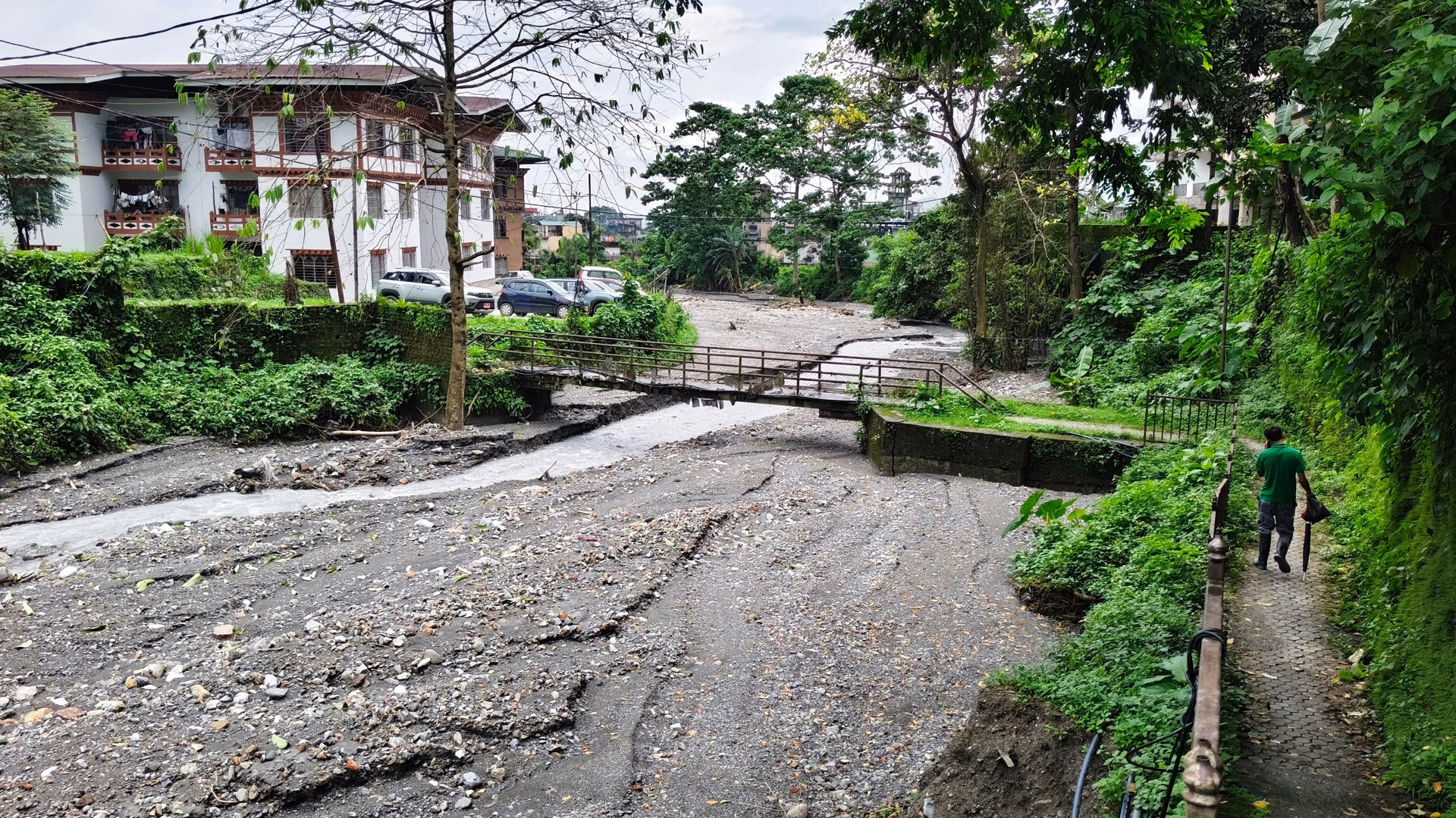 Stream in Pemaling affected by debris