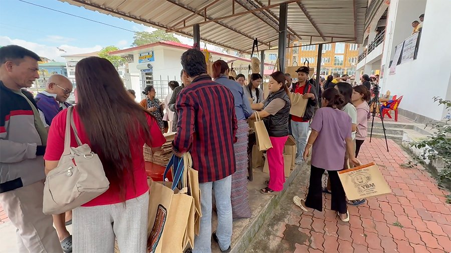 Vendor offering jute bags