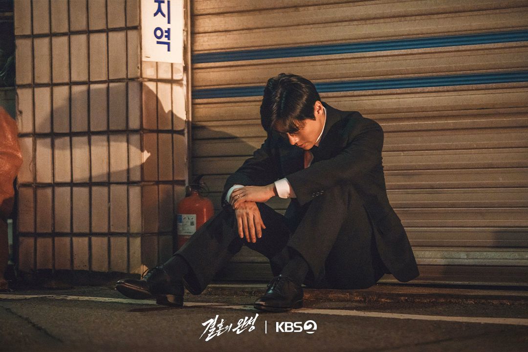 Dramatic still from "The Husband"