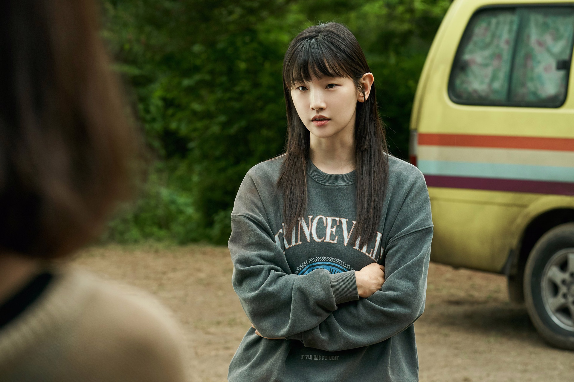 Young Ju displays her calculating nature while supporting her family's dangerous plan