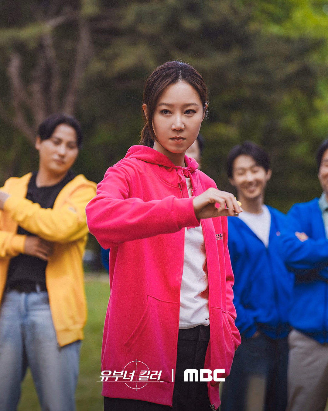 Kong Hyo Jin as Yu Bo Na displays her sniper precision during a dart game at the company retreat