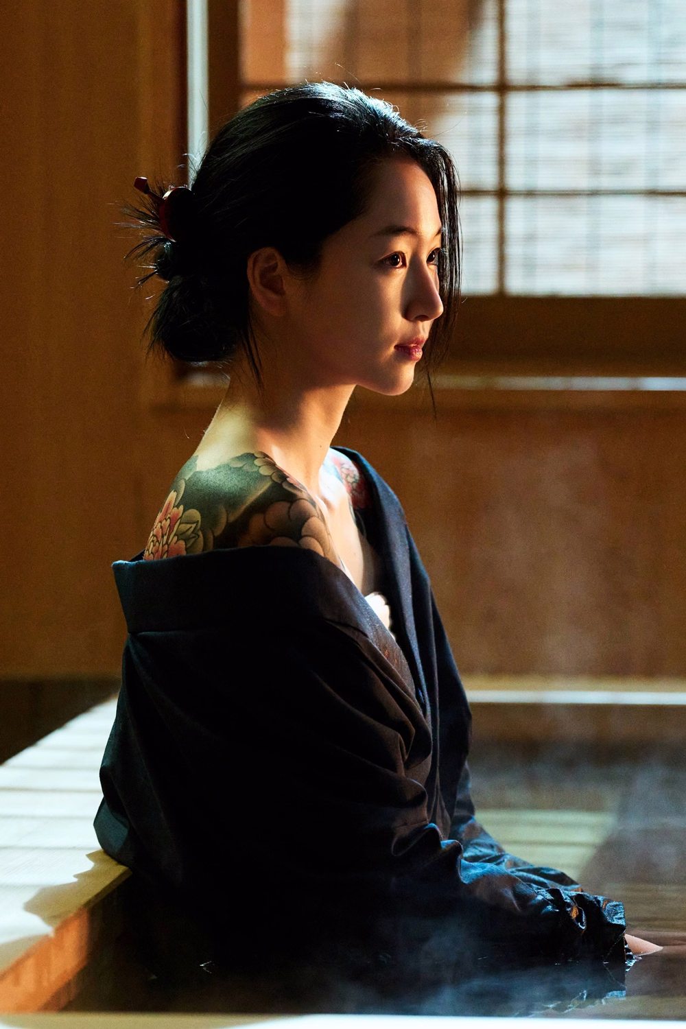 Ikeda Yuji with dramatic styling and organization tattoo