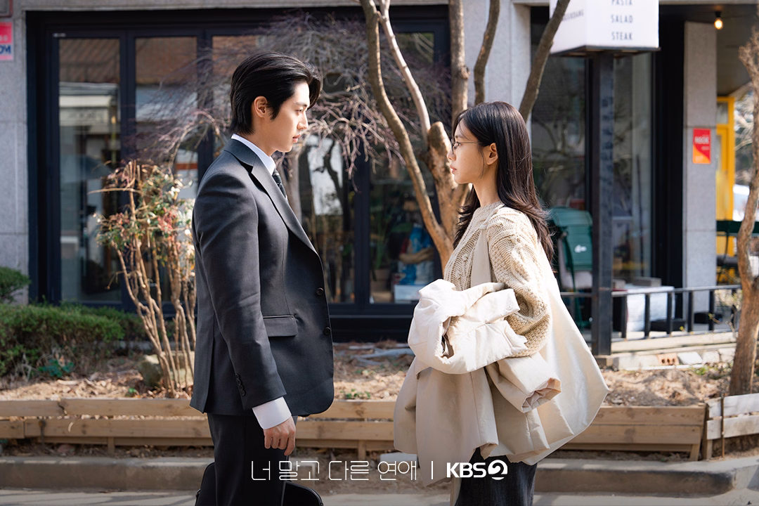 Lee Joo Ahn as Han Tae Seung in formal business attire showcasing his lawyer character