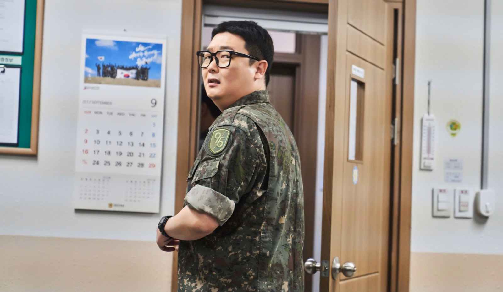 Kim Min Ho as Corporal Park Min Seok in New Recruit 4, appearing distressed during a secret operation
