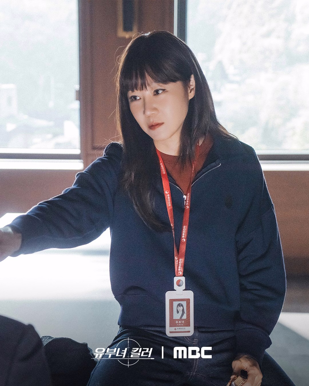 Yu Bo Na's characteristic calm demeanor after a successful operation