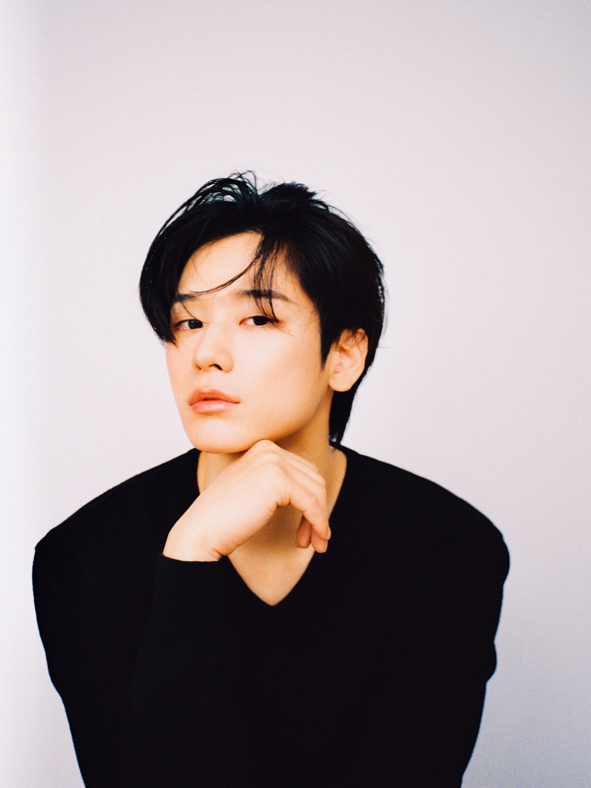 Juyeon in sophisticated professional attire