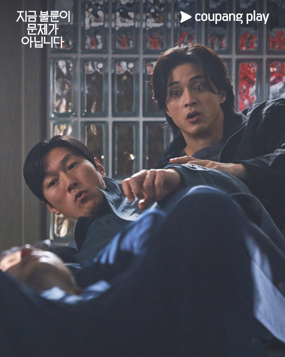 The couples in defensive positions during an intense confrontation