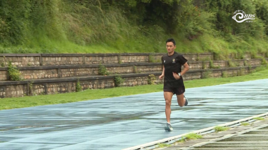 Sangay demonstrating focused training technique during evening sessions