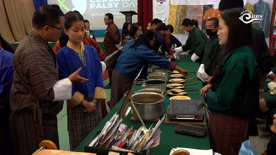 Close-up view of handcrafted items and dyed fabrics created by students during skill-based activities
