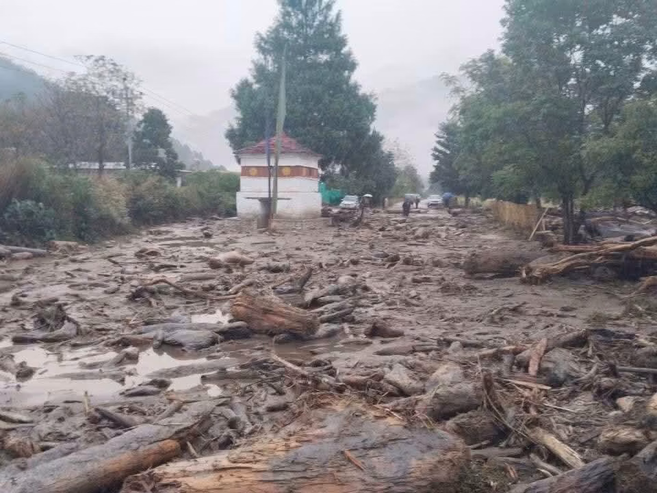 Flood damage showing destroyed facilities and debris at Gasa Tshachu