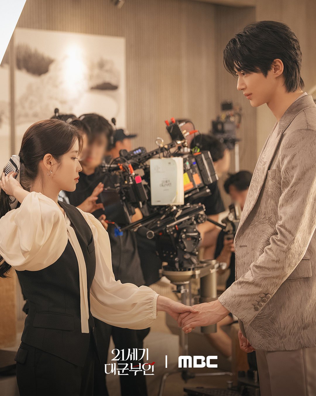 IU and Byeon Woo Seok reviewing scenes