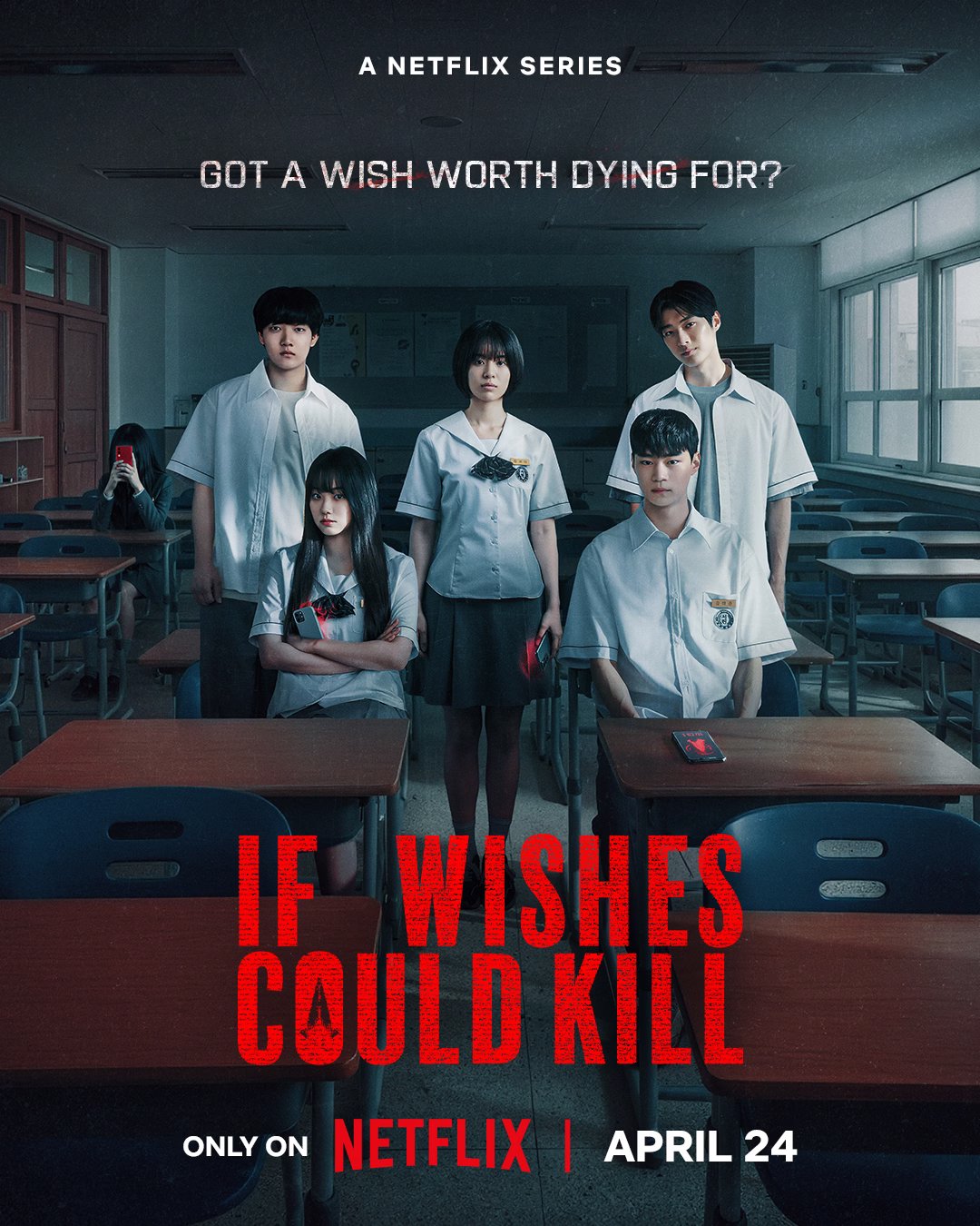 Darkness looms in the classroom scene from If Wishes Could Kill