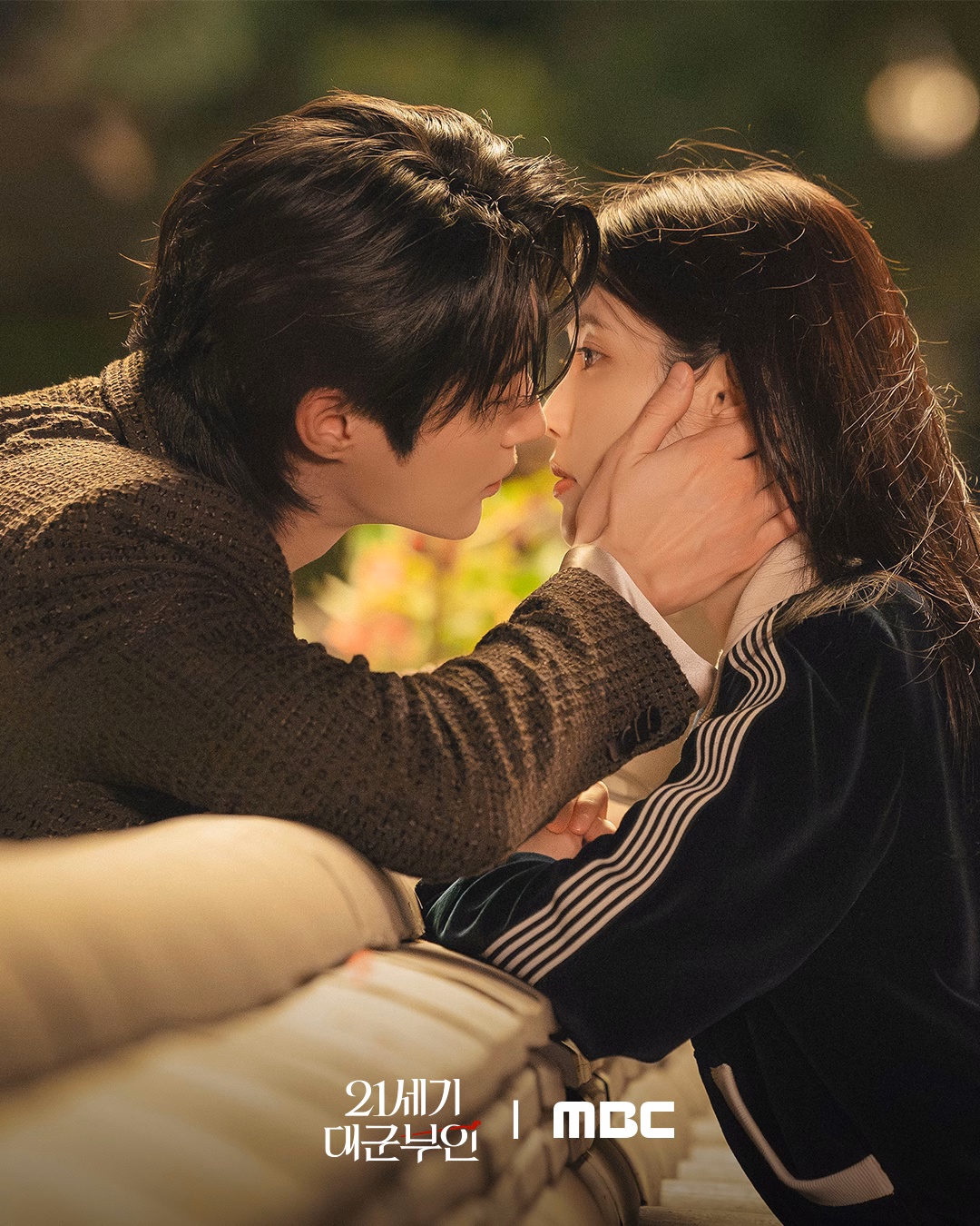 The cast sharing a laugh on set